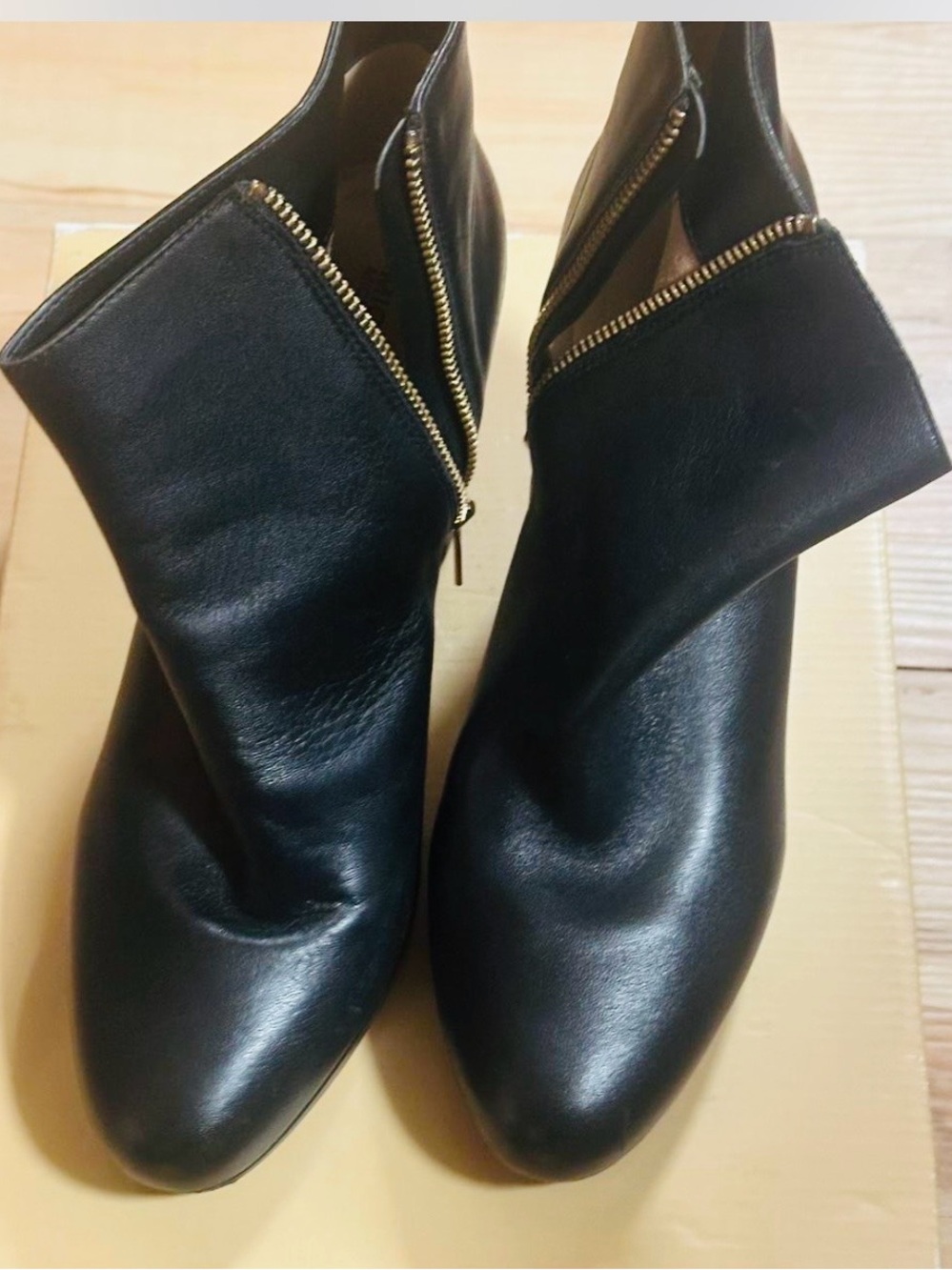 Michael Kors Sammy Platform Black Leather Ankle Booties with Gold Zipper.